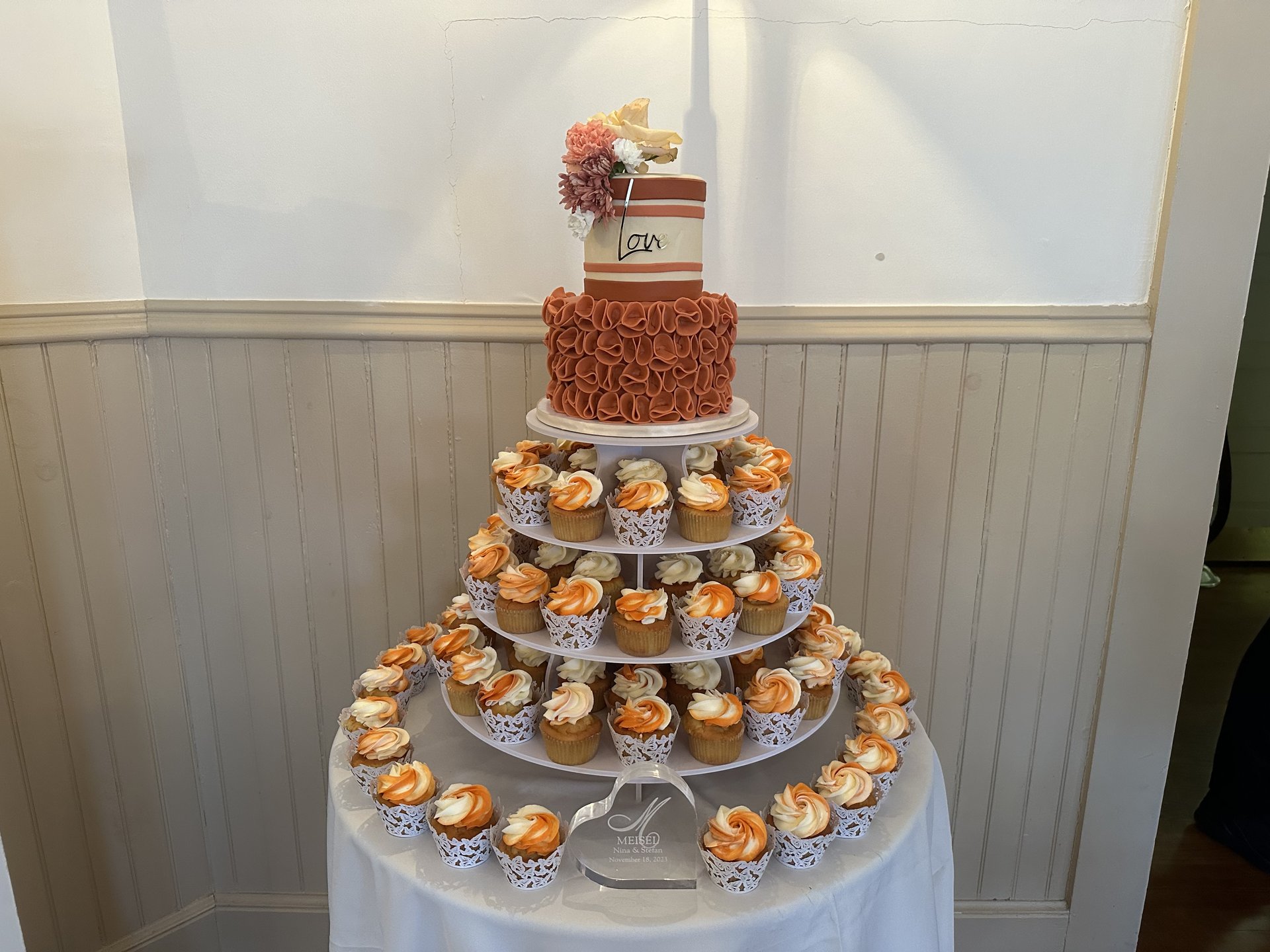 Elegant wedding cupcake tower with Love topper